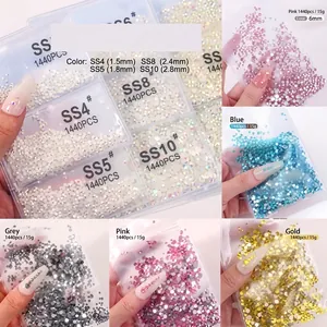 Macro shot of colorful resin heart nail art rhinestones showing various sizes and colors