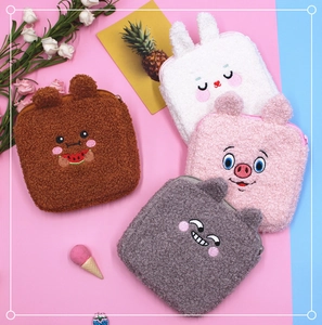 Detailed view of plush animal-shaped sanitary pads storage bags in four assorted colors