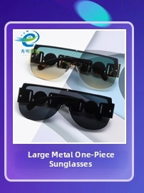 Detailed view of oversized square sunglasses with ornate metal chain-link hollow temples