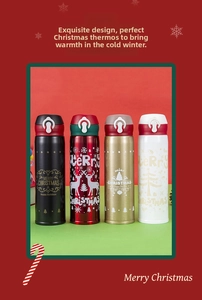 Detail of Christmas thermos bottles with reindeer patterns and one-click flip lids