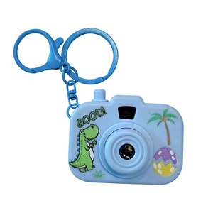 Blue cartoon dinosaur projection toy camera keychain for bag accessory with light