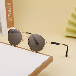 Classic round frame sunglasses with gold metal frame and dark grey lenses for women