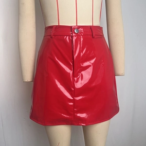 Detailed view of red glossy PU leather mini skirt with silver button and belt loops