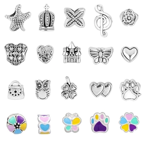 Macro view of blue ocean theme DIY charm beads including starfish and crown shapes