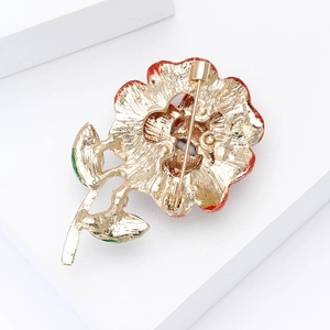 Detailed back view of the alloy rose brooch featuring a secure pin clasp and gold finish