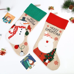 Christmas stockings featuring Santa and snowman patterns in festive linen and knit fabric