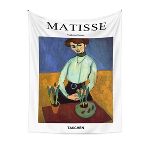 Detail of Bohemian wall tapestry with Matisse art print on white fabric background