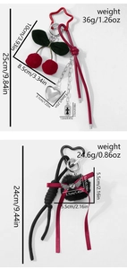 Detailed view of handmade cherry and heart bag charms with dimensions and weight specs
