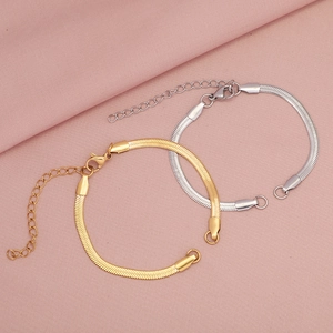 Elegant gold and silver flat snake chain bracelets with adjustable lobster clasp links