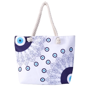 White canvas beach tote with blue evil eye pattern and nautical hemp rope handles
