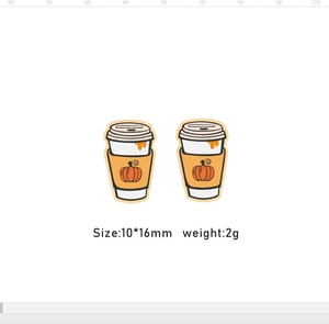 Detailed view of autumn pumpkin coffee cup earrings with 10x16mm size specifications