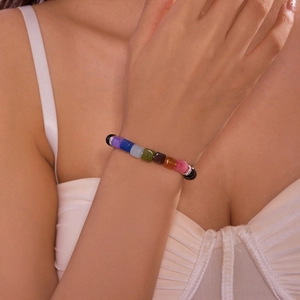 Handmade 8mm natural stone beaded bracelet with gradient geometric beads on a model