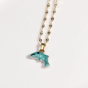 Gold chain necklace with a blue glitter dolphin pendant in stainless steel for women