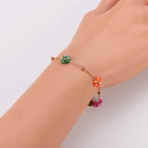 British style stainless steel beaded bracelet with green orange and pink crystal flowers