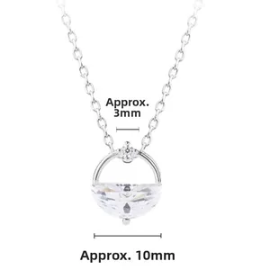 Macro view of silver necklace with a 10mm semi-circular clear stone and O-chain detail