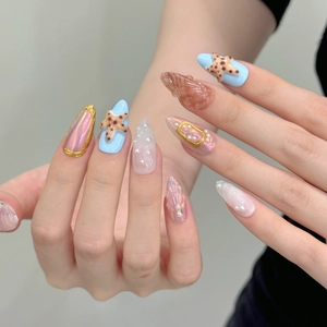 3D ocean-themed press-on nails with blue and purple seashells, starfish and pearls