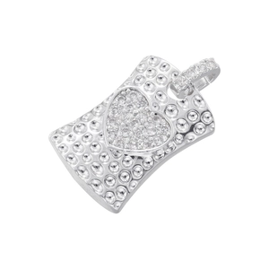Macro shot of silver square pendant with embossed texture and a sparkling heart center