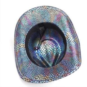 Detail of western cowboy hat interior with 100% polyester label and adjustable wind rope