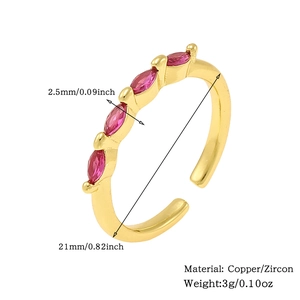 Detailed view of gold ring with pink marquise zircon stones and 21mm diameter specs