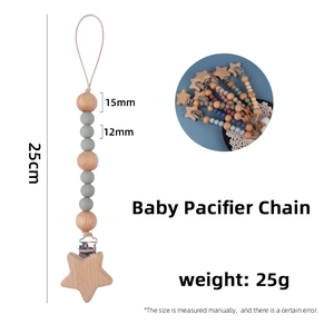 Detail of 25cm baby pacifier chain with beech wood star clip and silicone beads
