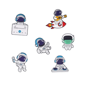 Set of 6 cute astronaut enamel pins featuring cartoon space explorers in white metal