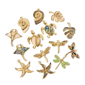 Detailed collection of gold ocean-themed pendants featuring shells and sea turtles