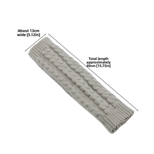 Detail of light gray cable knit leg warmer, size 40cm length and 13cm width dimensions
