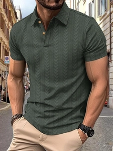 Close-up of moss green knit polo shirt featuring sophisticated herringbone weave texture