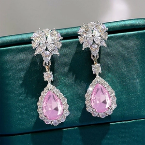 Elegant drop earrings featuring pink pear-cut gemstones with floral crystal stud details