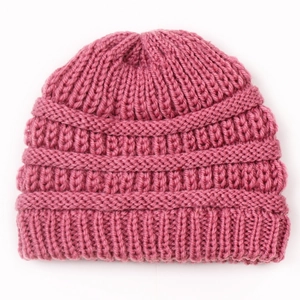 Cozy rose pink knitted baby beanie hat with thick ribbed texture for winter warmth