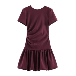 Elegant wine red short sleeve dress featuring stylish side ruching and puff hem design