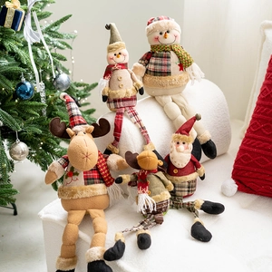 Plush Christmas long-legged dolls featuring Santa, snowman, and reindeer in home setting