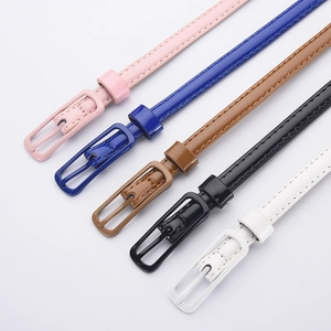 Set of five skinny candy-colored faux leather belts for women in pink blue brown black white
