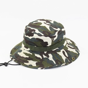 Macro detail of woodland camouflage ripstop fabric and tactical vents on boonie hat