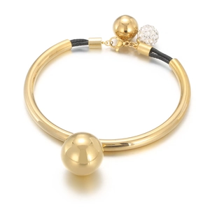 Titanium steel braided rope bracelet with gold beads and white crystal charms on white background