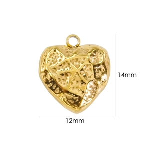 Detailed view of golden heart pendant with hammer texture finish measuring 14mm by 12mm