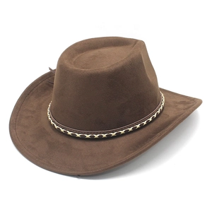 Detailed view of woven decorative band on brown suede cowboy hat brim