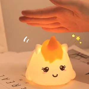 Cartoon unicorn silicone night light with warm glow and touch-sensitive sensor feature