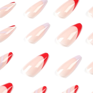 Short almond press-on nails with red french tips and purple wavy lines on nude base