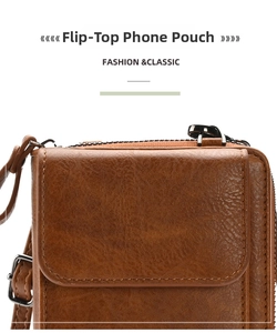 Close-up of brown litchi pattern leather flip phone bag with metallic zipper detail