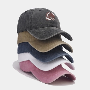 Collection of washed cotton baseball caps in five vintage colors with sports embroidery