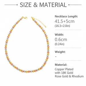 Detailed view of 18K gold-plated copper beaded necklace showing 6mm tricolor metal beads