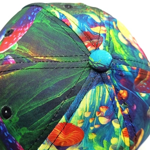 Close-up of colorful mushroom print baseball cap with twill fabric and embroidery