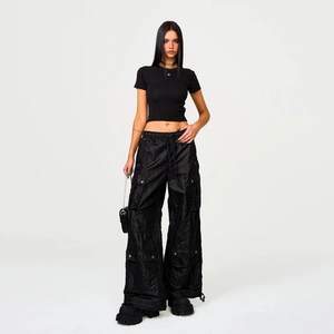 Slim fit black cropped tee with embroidered cross and multi-pocket cargo pants streetwear