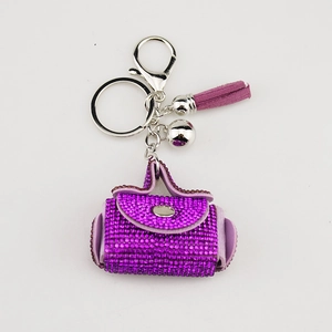 Chic purple rhinestone mini handbag keychain with matching tassel and silver hardware