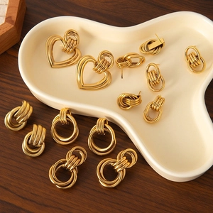 Elegant set of 18K gold plated stainless steel heart and twisted hoop earrings