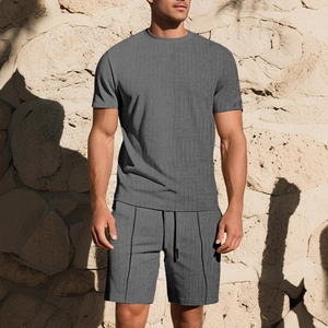 Detail of men's grey casual set showing geometric jacquard texture on shorts and shirt