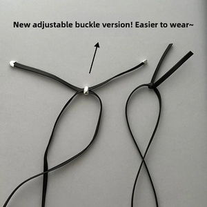 Detail view of the black cord necklace comparing new adjustable bead with classic knot style