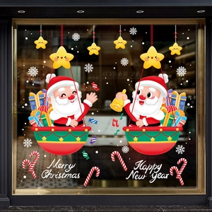 Adesivi per finestre bifacciali con Babbo Natale in mongolfiera e stelle natalizie