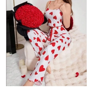 Women's two-piece pajama set with red heart print and ribbed knit tank top and pants